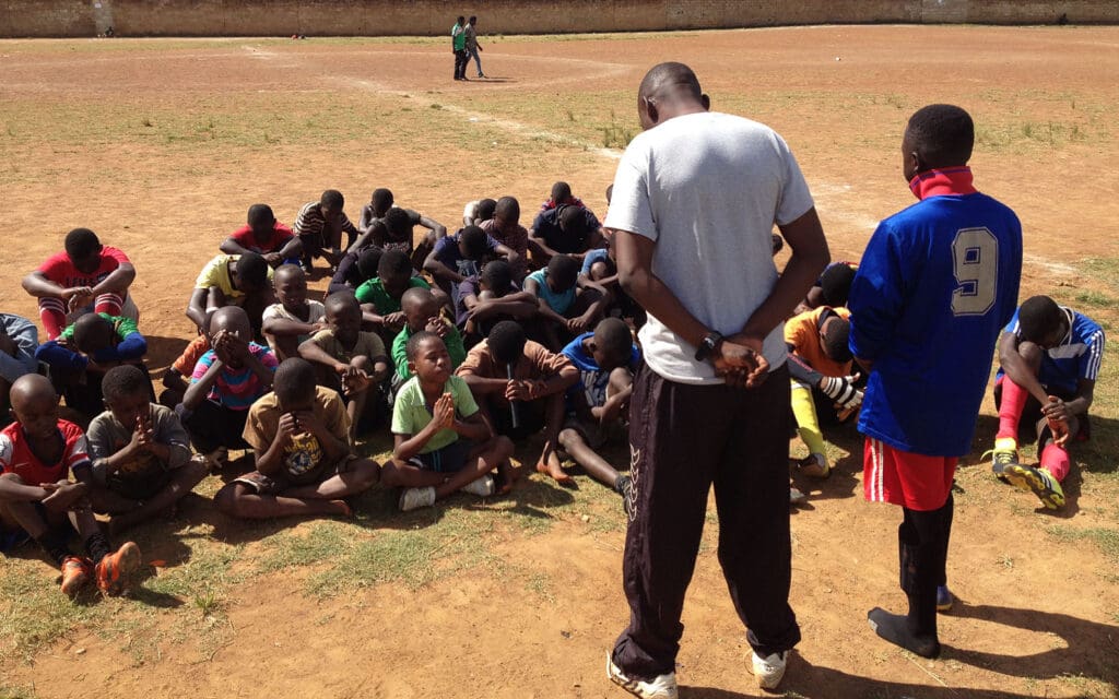 af zambia-prayer time on the football field