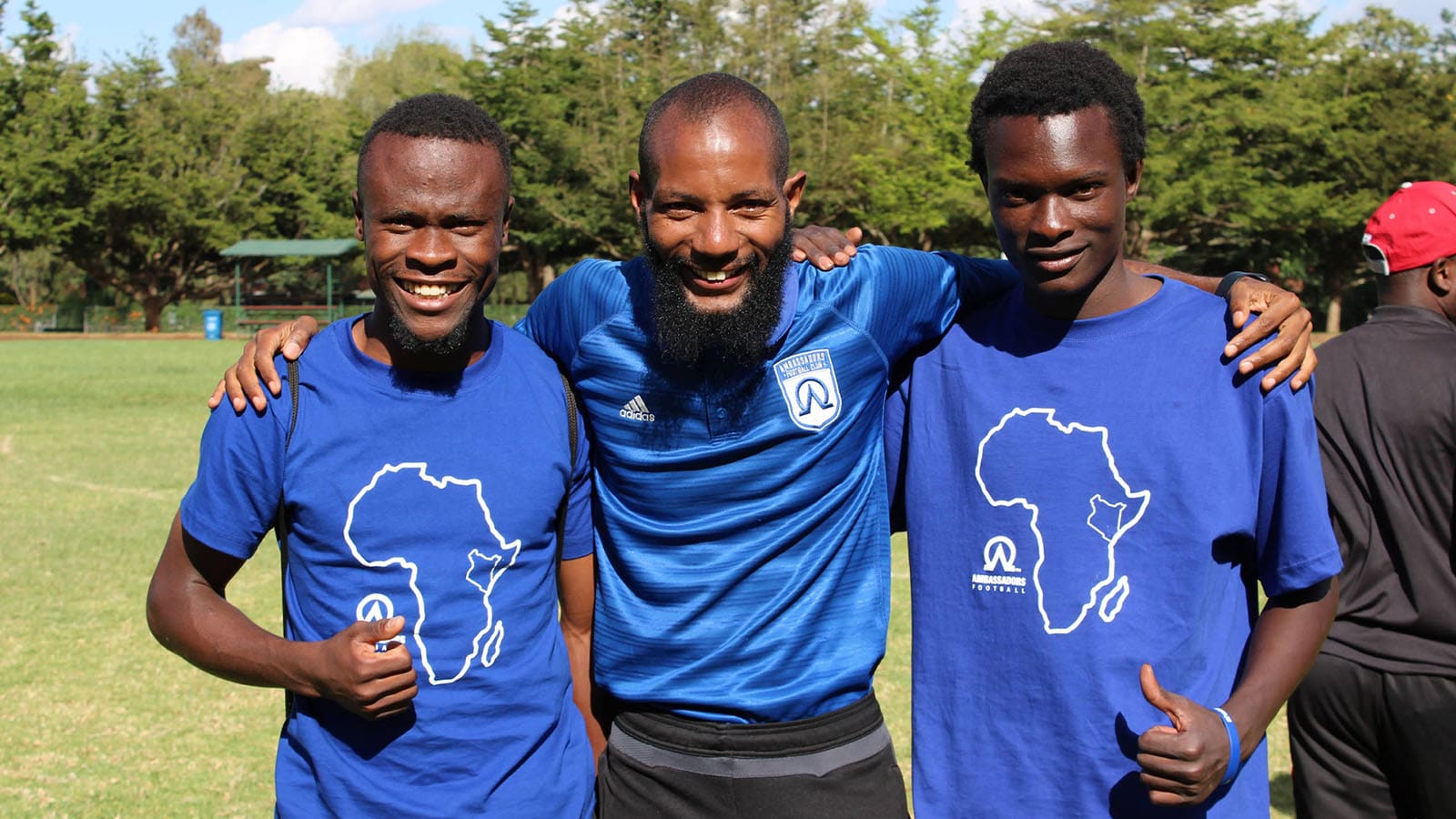 football coach with volunteers-v3