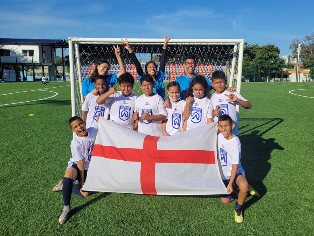 colombia-football-camp-team-with-a-country-flag.jpg