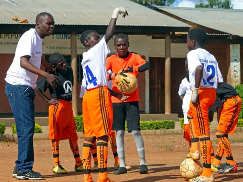 a-group-of-kids-playing-football-at-Ambassadors-Football-Zambia.jpg