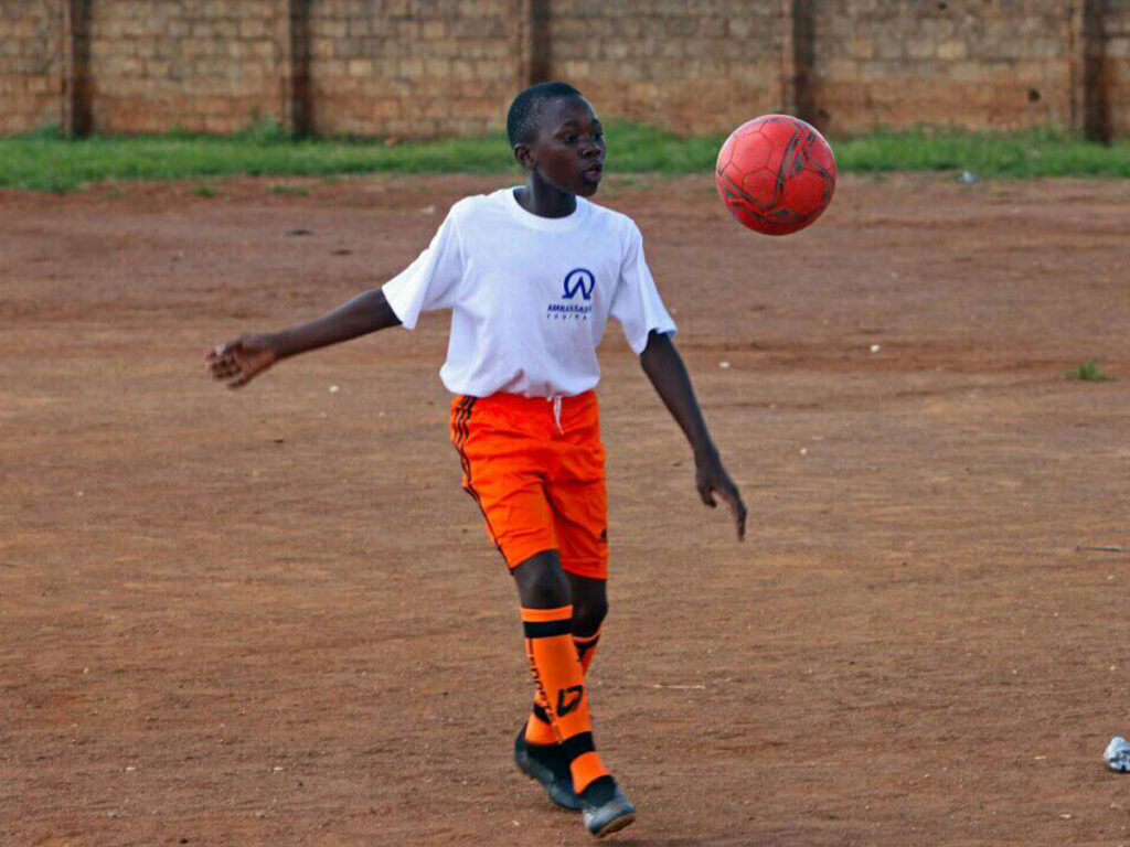 youth-juggling-football-at-Ambassadors-Football-Zambia.jpg